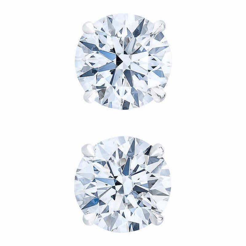 Clarity: VS2 
Earring Style: Stud
Metal: White Gold
Stone: Diamond
Stone Shape: Round
Total Diamond Carat Weight: 4
Total Number of Stones: 2


** Comes with GIA Certificate for both diamonds and Appraisal certificate to reflect value of $70,550.