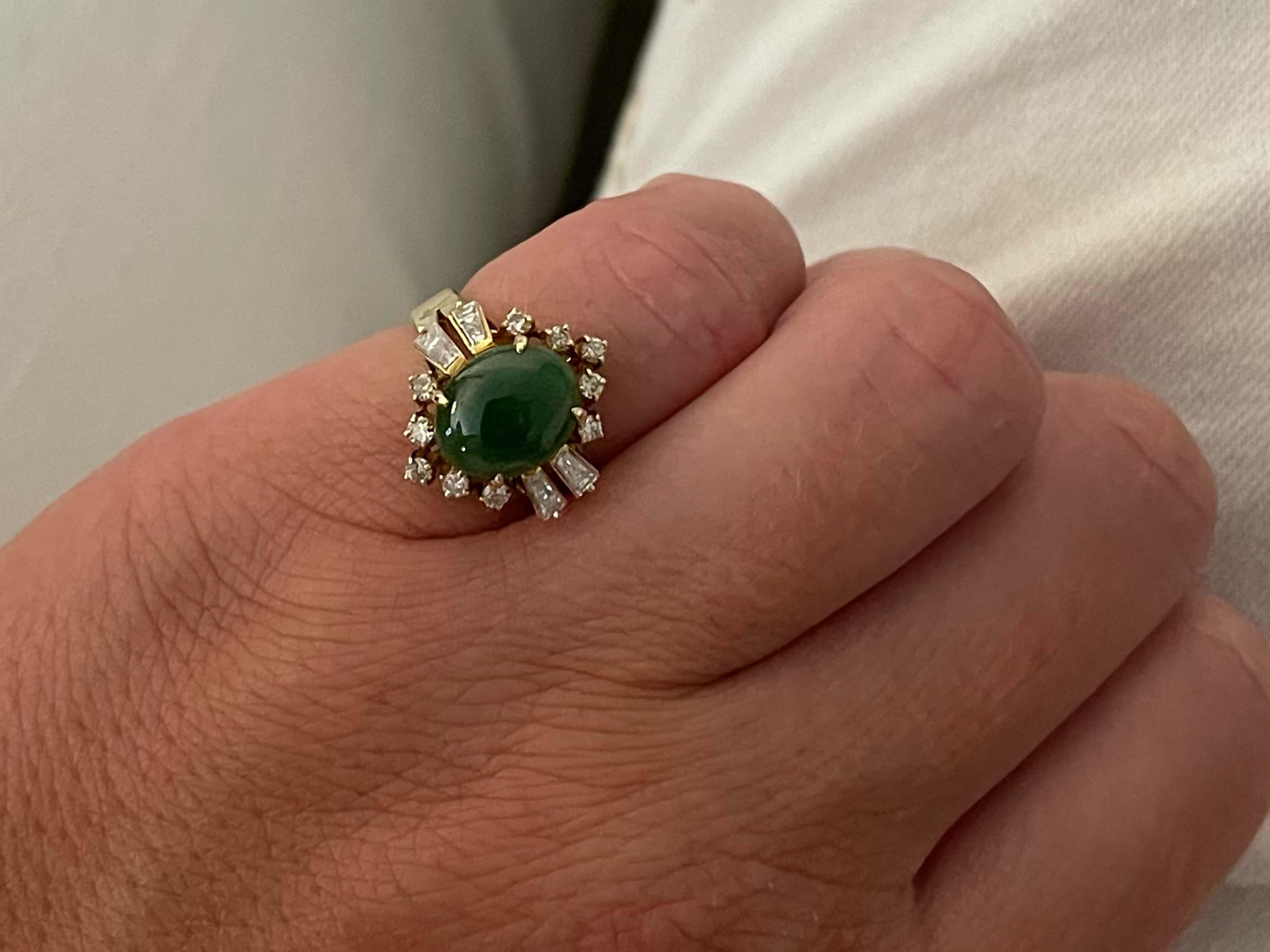 Item Specifications:

Metal: 14K Yellow Gold 

Style: Statement Ring

Ring Size: 4.25 (resizing available for a fee)

Total Weight: 4.1 Grams

Gemstone Specifications:

Center Gemstone: Jadeite Jade

Shape: Oval

Color: Green

Cut: Cabochon 

Jade