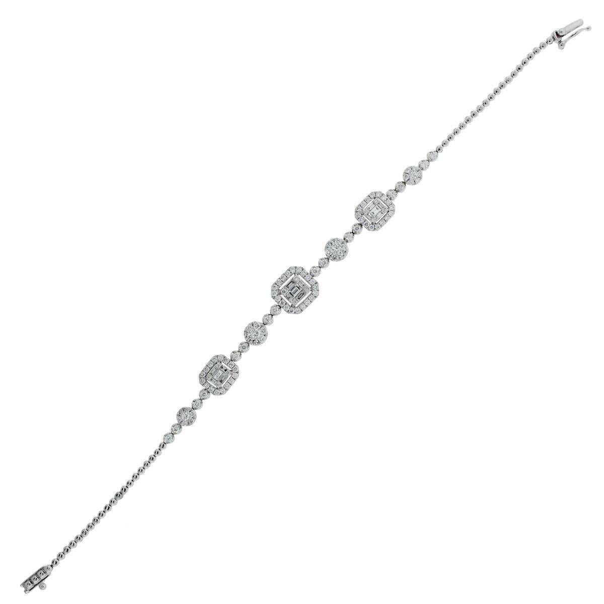 Material: 18k white gold
Diamond Details: Approximately 1.80ctw of round brilliant and baguette shape diamonds. Diamonds are G in color and SI in clarity
Fastening: Tongue in box clasp with safety latch
Length: Will fit a 7″ wrist
Item Weight: 8.6g