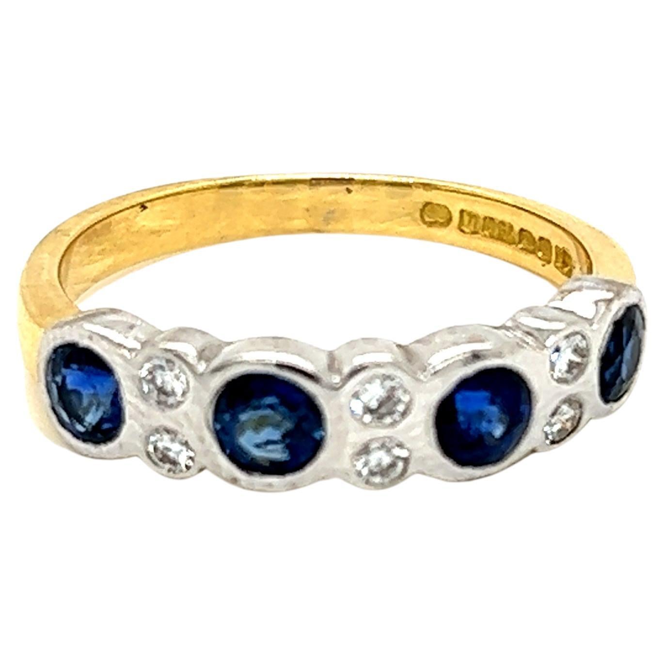 Round Brilliant Blue Sapphire and Diamond 18 Karat Gold Band Ring For Sale