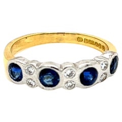 Bague en or 18 carats avec saphir bleu brillant et diamant