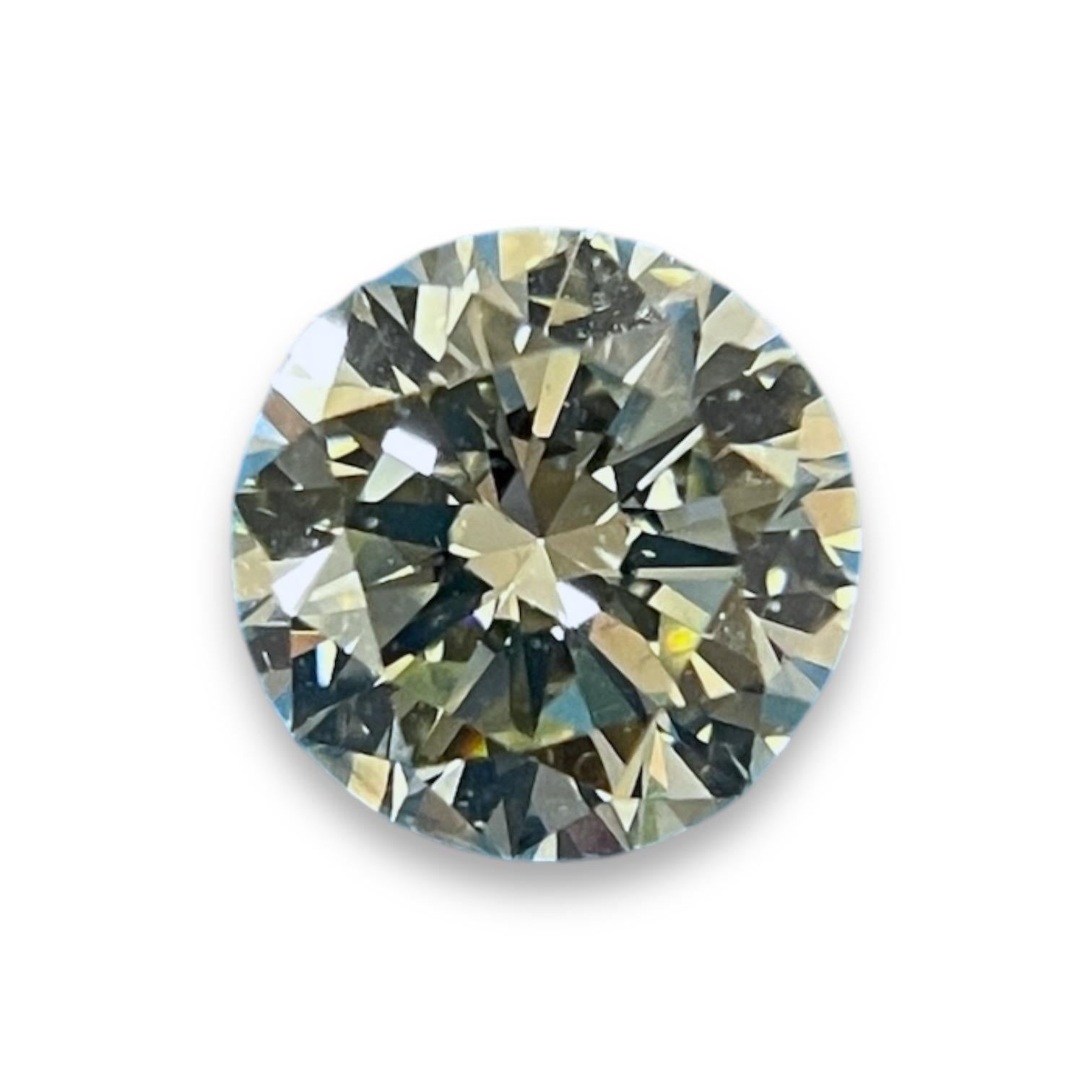 This stunning round brilliant cut diamond showcases an exceptional blend of craftsmanship and brilliance. Certified by GIA, it guarantees the highest standards of quality and authenticity. Perfect for anyone seeking a timeless gemstone to enhance