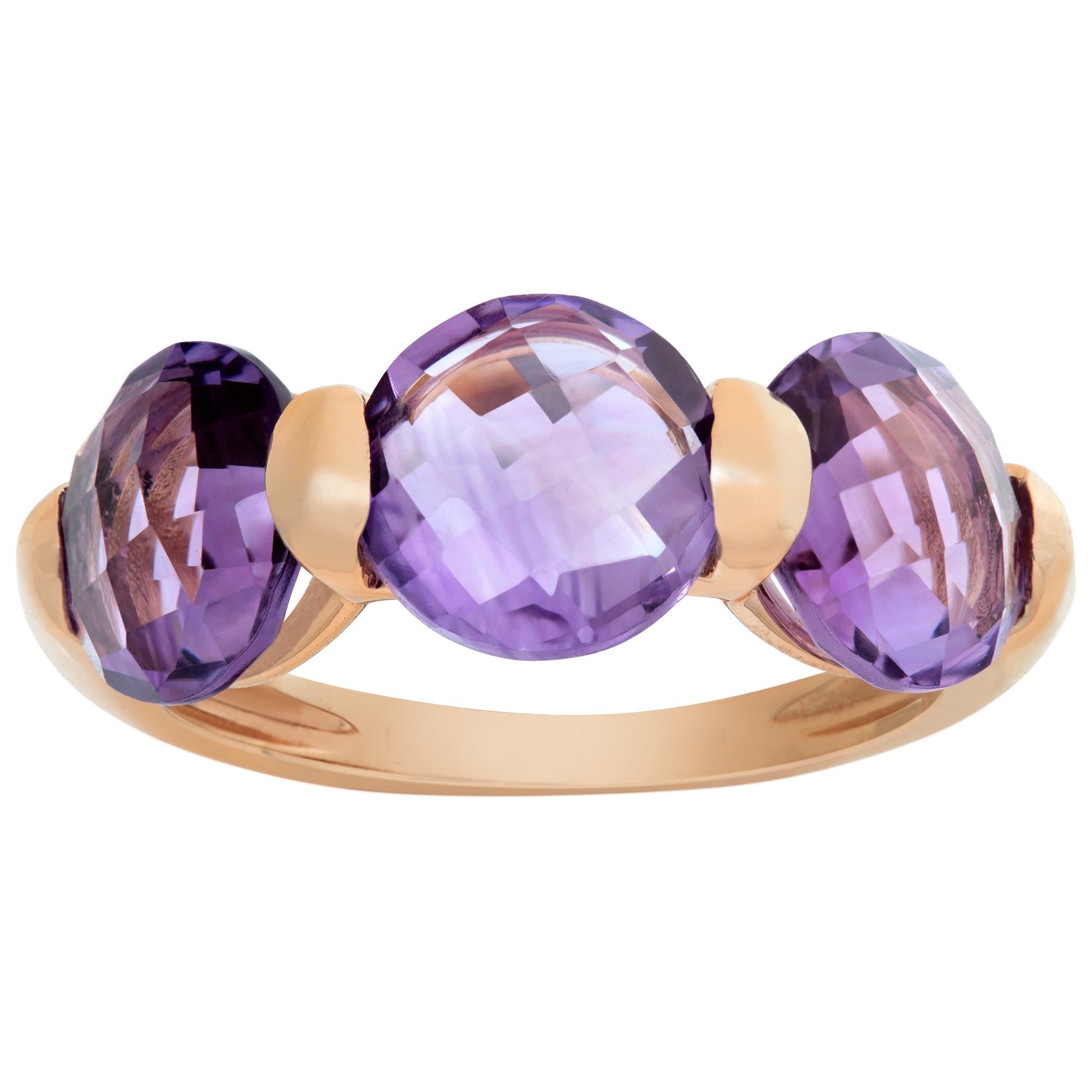 Round brilliant cut Amethyst ring set in 18k yellow gold. Size 7.This ring is currently size 7 and some items can be sized up or down, please ask! It weighs 3.1 pennyweights and is 18k.
