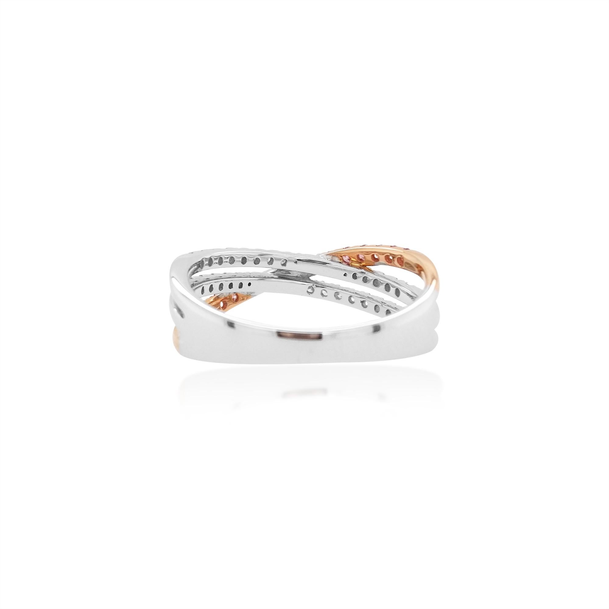 Stylish Band ring with a beautiful line of Rare Argyle Pink diamonds styled with white diamonds, made in 18 K Gold

Round Brilliant Cut Natural Pink Diamonds - 0.18 cts
Round Brilliant Cut White Diamond - 0.20 cts
Made in Gold

HYT Jewelry is a Fine