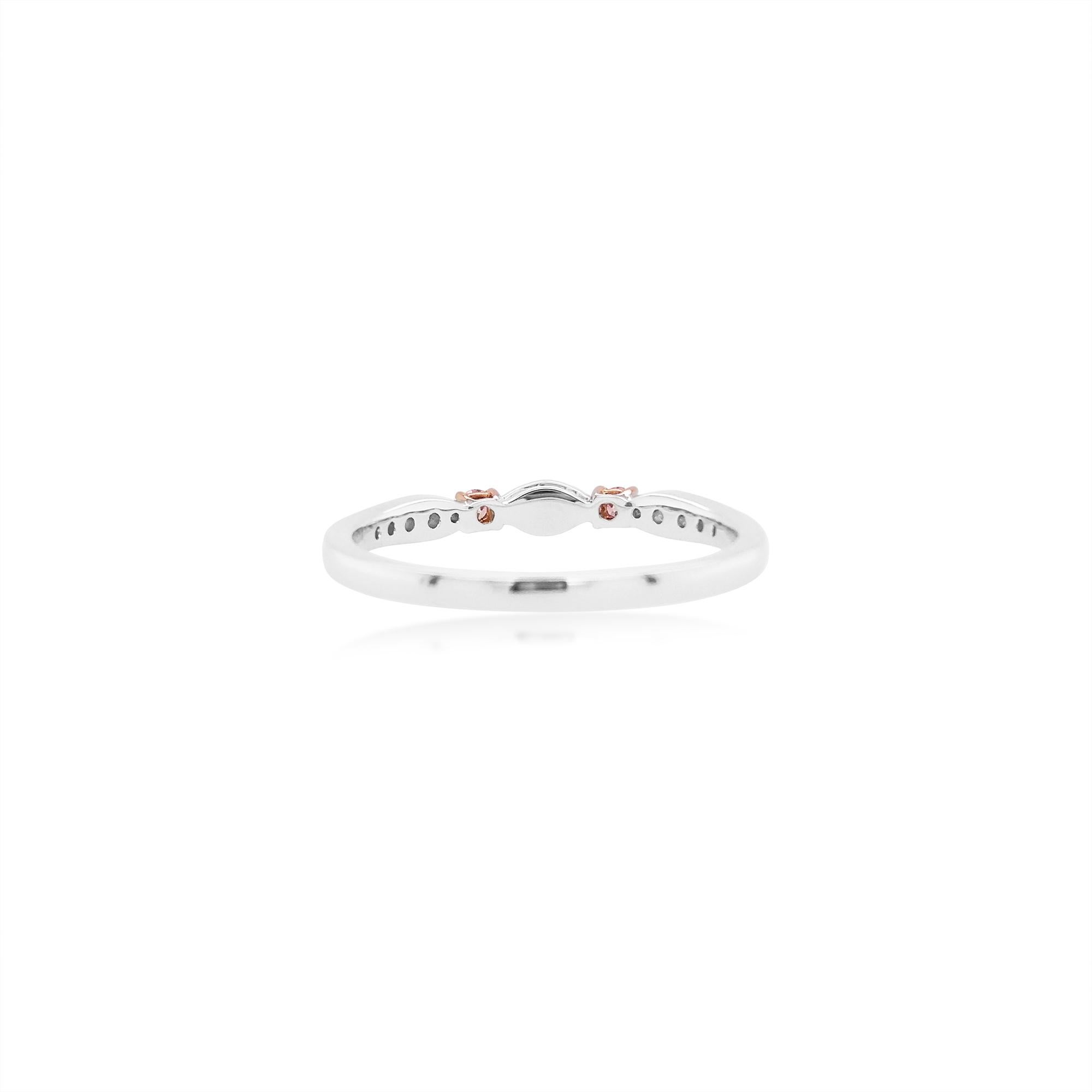 Band ring with a dual combination of Rare Argyle Pink diamonds styled with white diamonds, made in 18 K Gold

Round Brilliant Cut Natural Pink Diamonds - 0.06 cts
Round Brilliant Cut White Diamond - 0.14 cts
Made in Gold


HYT Jewelry is a Fine