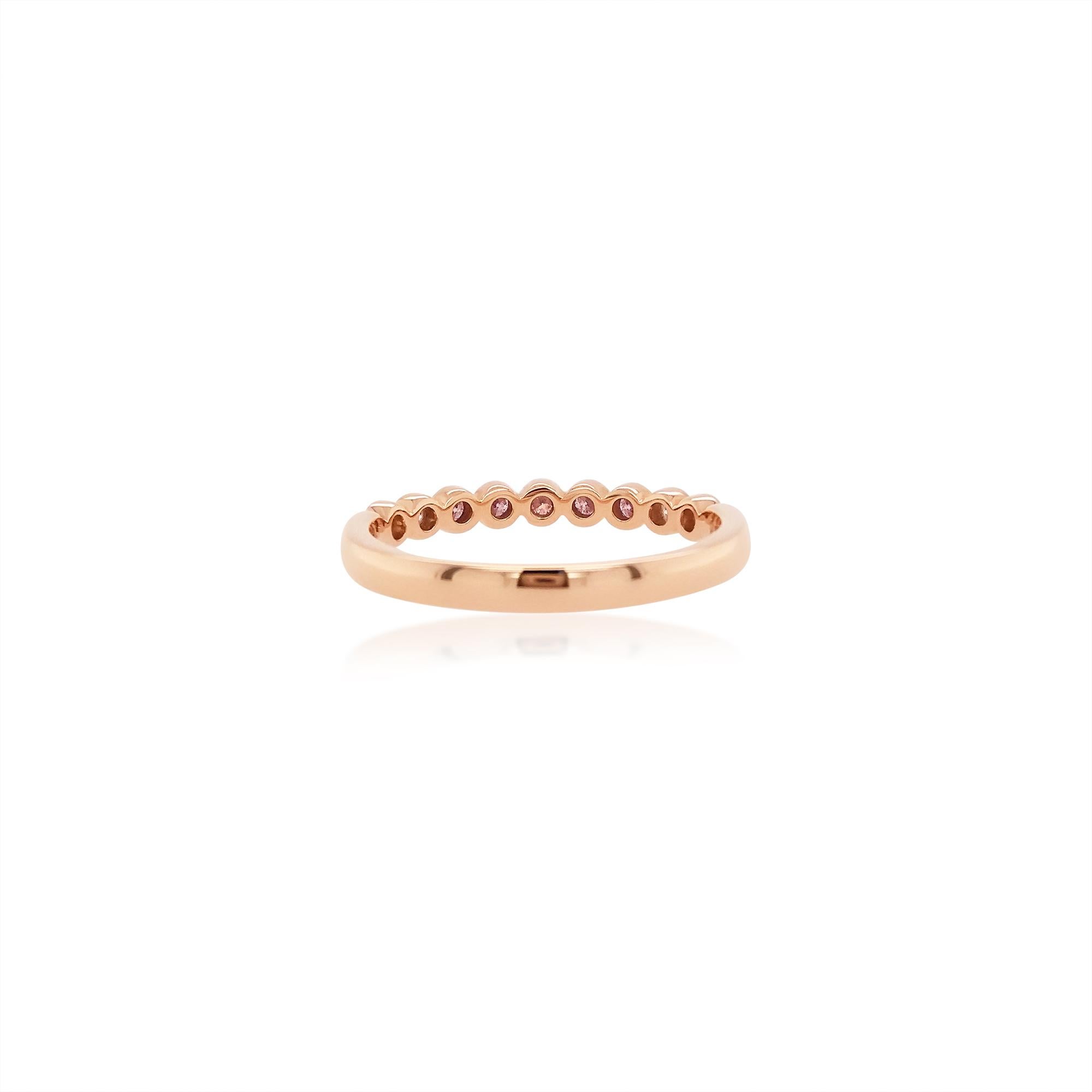 Stylish Band ring with a beautiful line of Rare Argyle Pink diamonds styled with white diamonds, made in 18 K Gold

Round Brilliant Cut Natural Pink Diamonds - 0.12 cts
Round Brilliant Cut White Diamond - 0.09 cts
Made in Gold

HYT Jewelry is a Fine