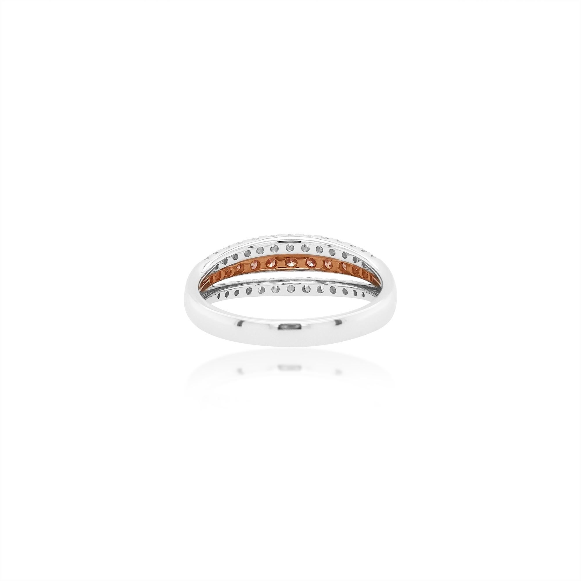 Ring styled with a delicate band of Argyle Pink Diamonds,  decorated with white diamonds, set in 18K Gold

Round Brilliant Cut Natural Pink Diamonds - 0.29 cts
Round Brilliant Cut White Diamond - 0.37 cts
Made in Gold

HYT Jewelry is a Fine Diamond