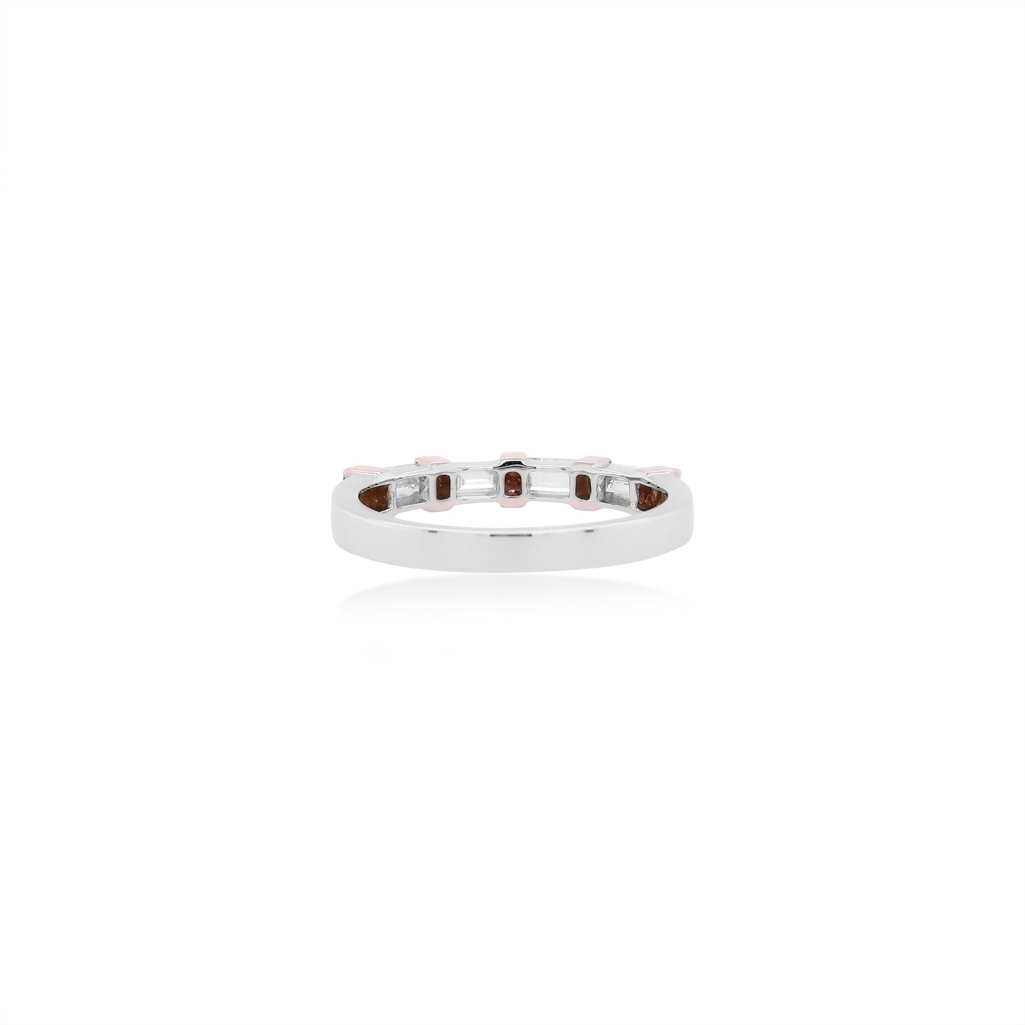 Ring styled with a delicate band of Argyle Pink Diamonds,  decorated with white diamonds, set in 18K Gold

Round Brilliant Cut Natural Pink Diamonds - 0.11 cts
Round Brilliant Cut White Diamond - 0.61 cts
Made in 18K Gold

HYT Jewelry is a Fine