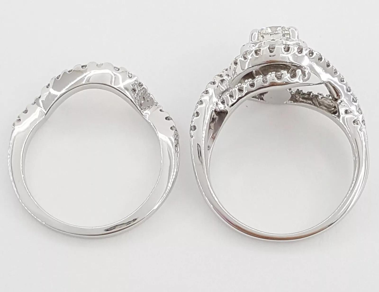 Round Brilliant Cut Diamond Double Halo 1.47 ct 14k White Gold Crossover Engagement Ring & Band Set



The set weighs 7.1 grams, size 4.75; the center stone is a Natural Round Brilliant Cut diamond weighing 0.74 ct, G in color, VS2 in clarity,