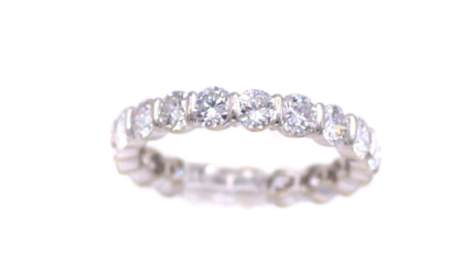 Beautifully well handcrafted 18 karat white gold diamond eternity band set with 18 perfectly matched bright white and lively round brilliant cut diamonds. The average color and clarity has been graded as F VS. Measured to weigh approximately 3.35