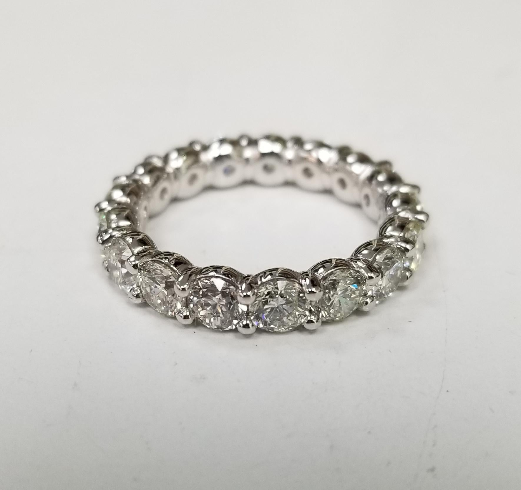  BRILLIANT CUT DIAMOND ETERNITY RING IN PLATINUM 5.10 CTW. Set in comfort fit and shared prongs.
Specifications:
    main stone: BRILLIANT CUT DIAMOND
    diamonds: 17 PIECES
    carat total weight: 5.10
    color: -G
    clarity: VS2
    brand: