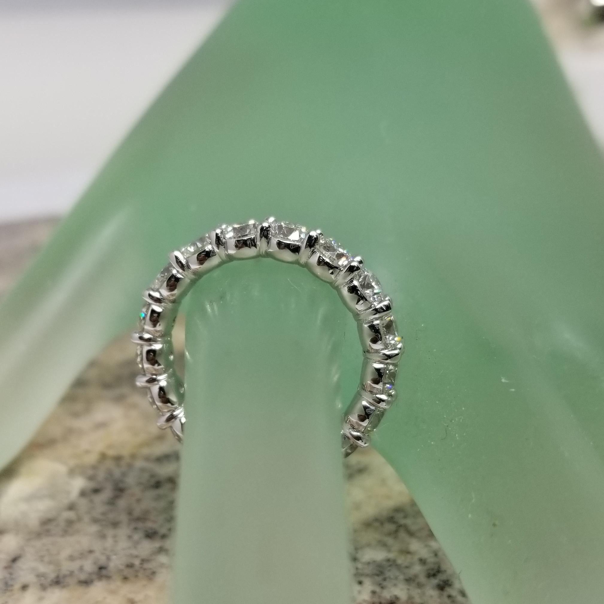 Modern Round Brilliant Cut Diamond Eternity Platinum Ring 5.10 Carats For Sale