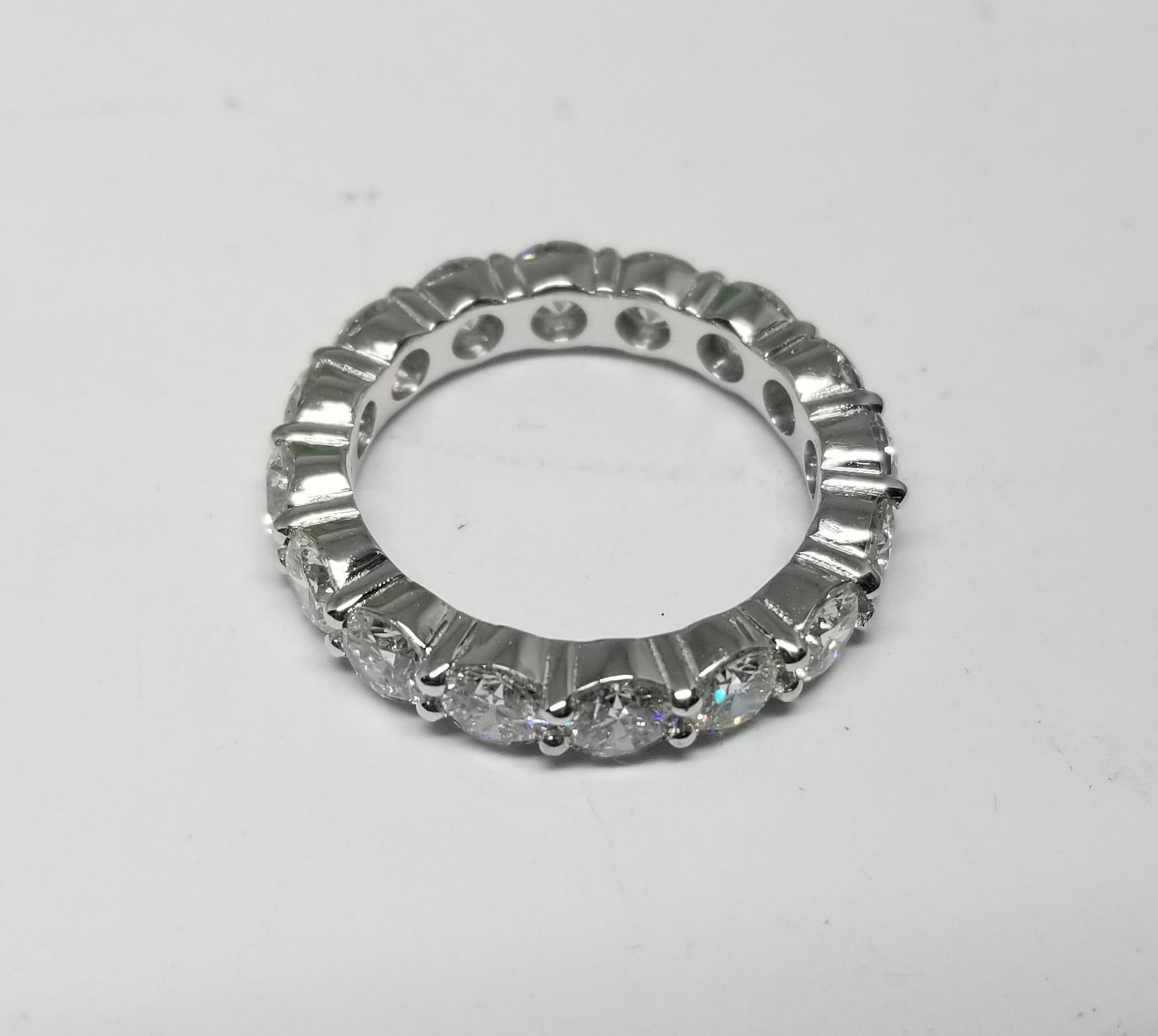 Contemporary Round Brilliant Cut Diamond Eternity Ring 3.51 Carats For Sale