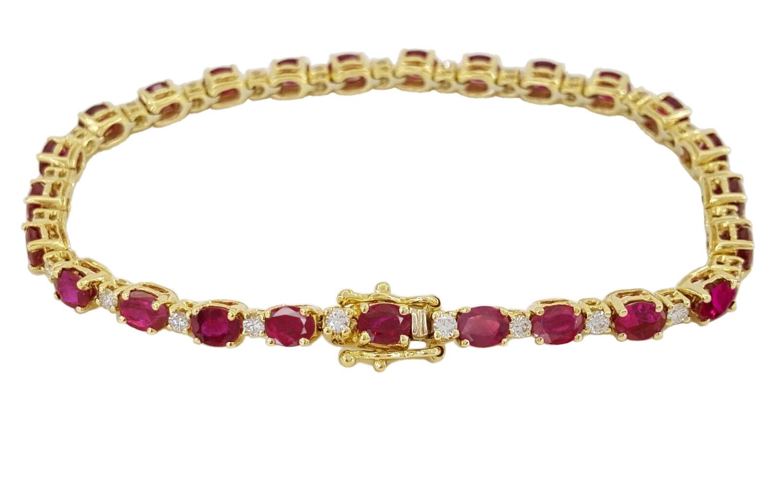 Round Brilliant Cut Diamond & Oval Cut Red Ruby 18k Yellow Gold Tennis Bracelet.

The bracelet weighs 12.7 grams, 7