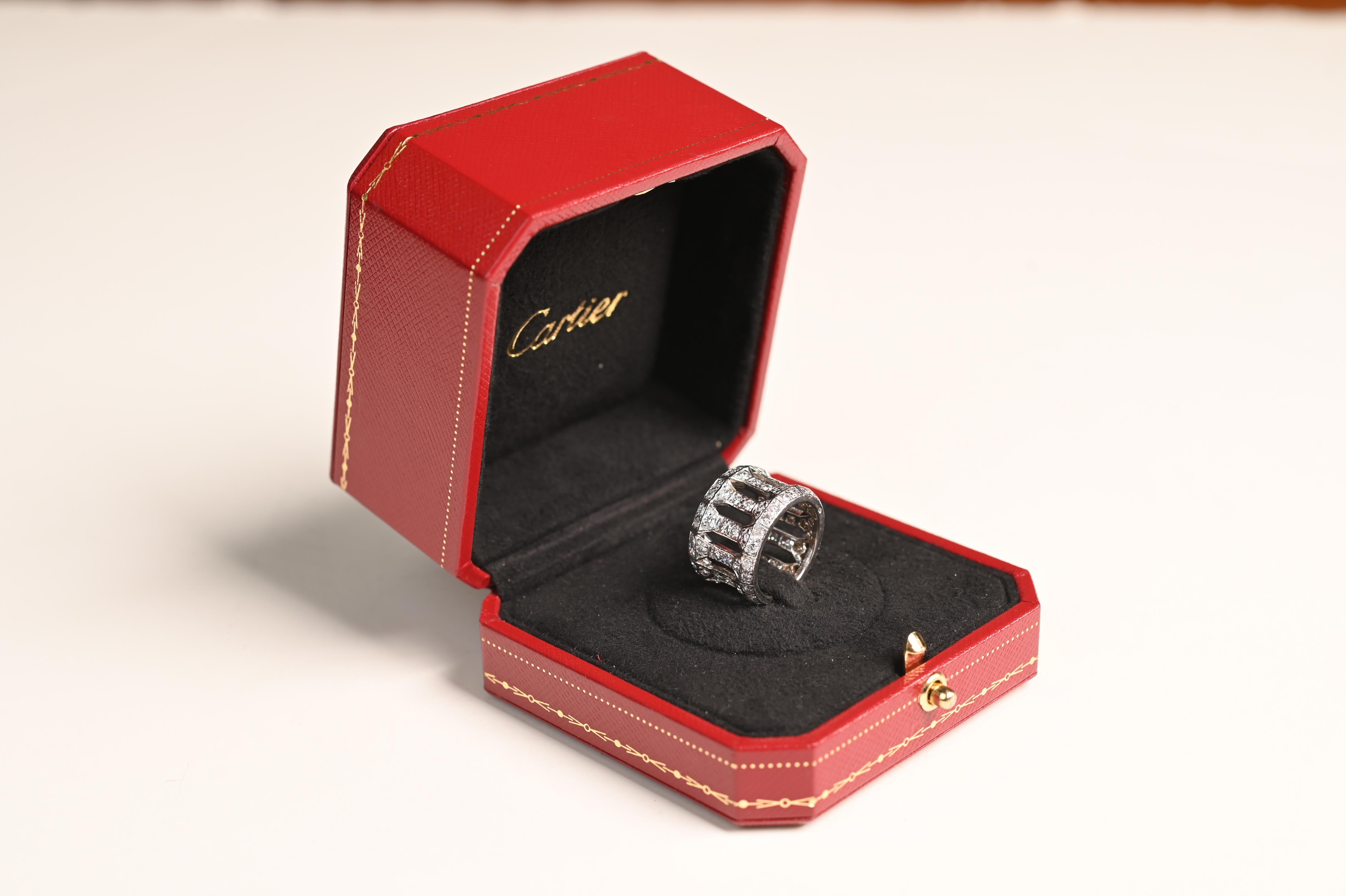This exquisite vintage Cartier pillar ring showcases a striking cathedral-inspired design, featuring twelve sculpted pillars that encircle the band in a harmonious, architectural composition. A true testament to Cartier’s craftsmanship, the ring is