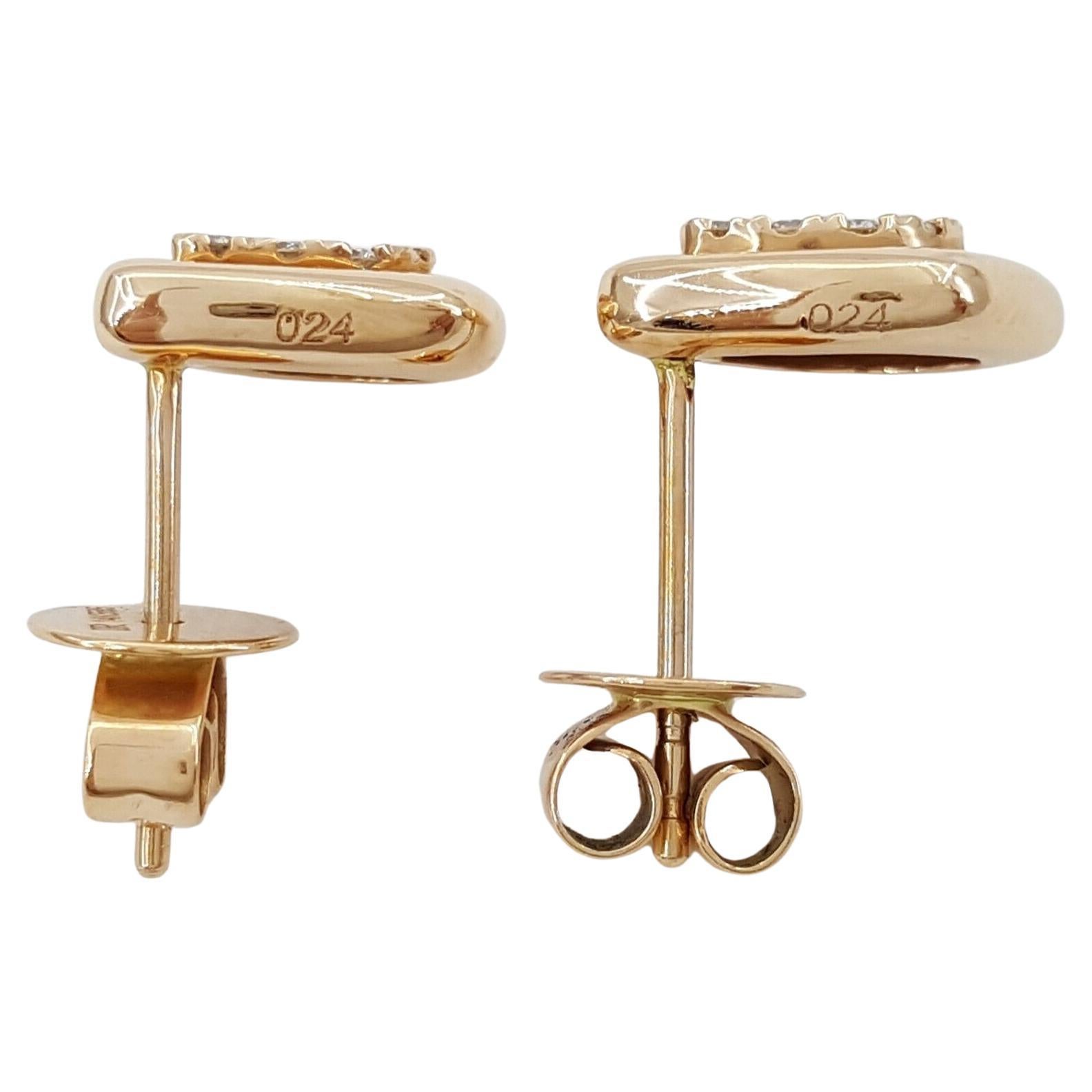 Round Brilliant Cut Diamond Stud Earrings in 14k Rose Gold. 
The earrings weigh 2.3 grams, there are 22 Natural Round Brilliant Cut Diamonds weighing approximately 0.24 ct, G-I in color, VS-SI clarity, 9 x 11 mm.
Both earrings are stamped 