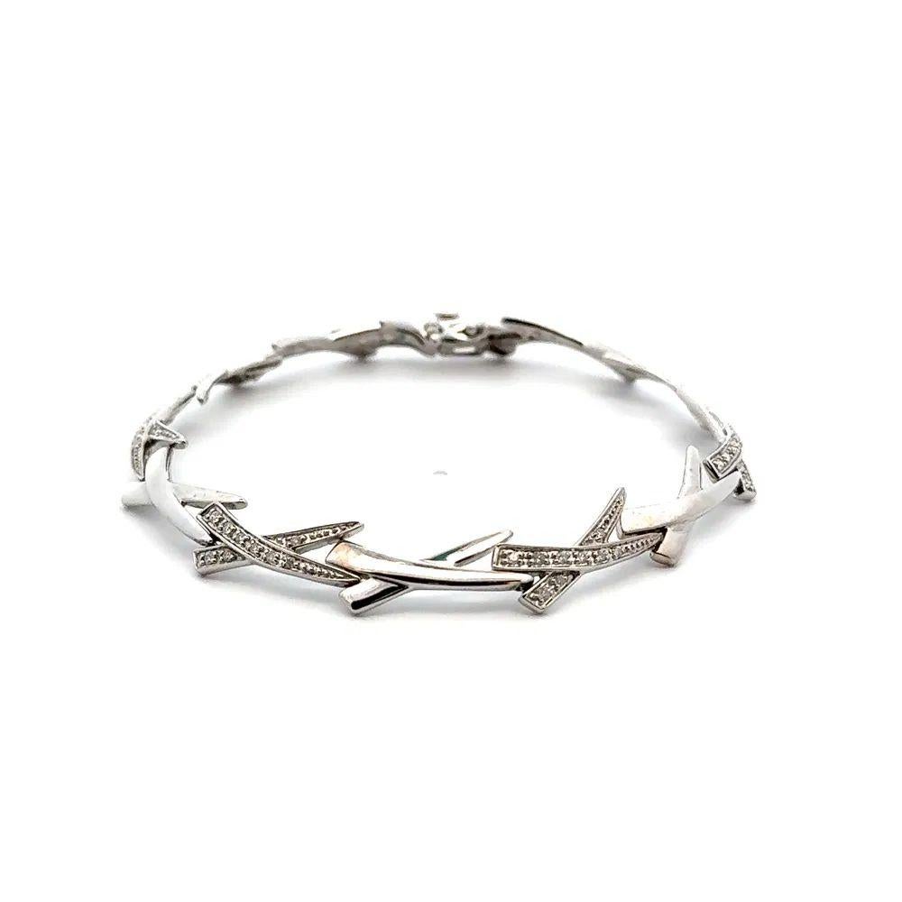 Simply Beautiful! Classic and Chic Hand crafted Polished 14K White Gold X Alternating Link Round Brilliant Cut Diamond Bracelet. Pave Hand set with RBC Diamonds, weighing approx. 0.55tcw. Bracelet measures approx. 7” long. More Beautiful in Real