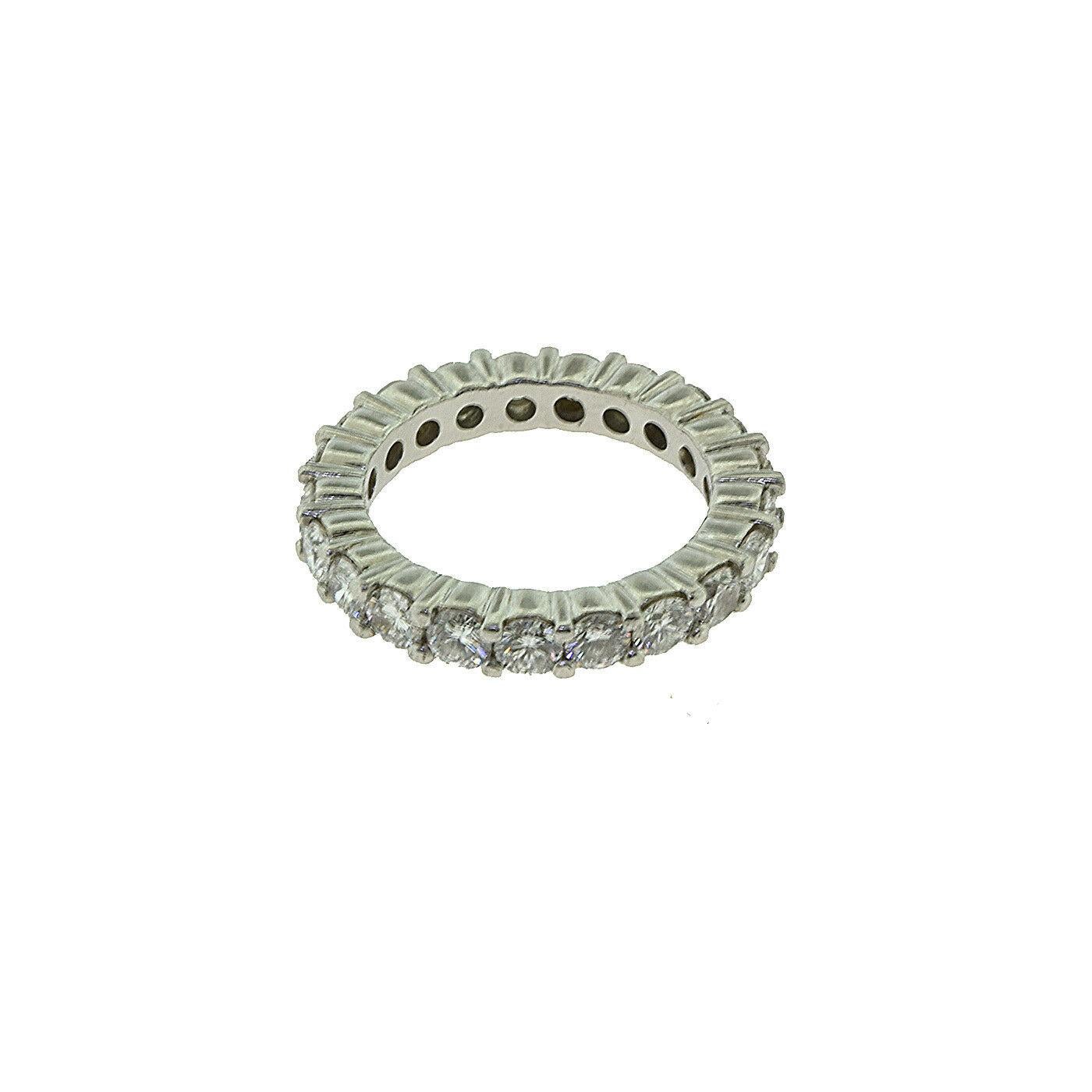 Ring Size: 4 

Style: Eternity Band Ring

Metal: Platinum

Metal Purity: 950

Stones: Round Brilliant Cut Diamonds

Diamond Color: G - H

Diamond Clarity: VVS

Total Carat Weight: 2.03 ct

Total Item Weight (grams): 

​​​​​​​Includes:  2 Year