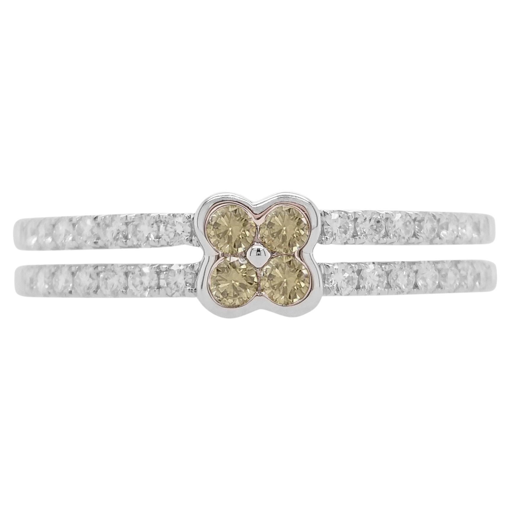 18 Karat Goldring mit rundem grünem Diamanten im Brillantschliff und weißem Diamanten