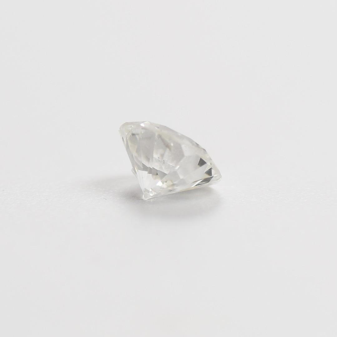Loose .94 carat round brilliant cut
No grading certificate.
Grading is done by a GIA graduate gemologist.
The color is H to i color, Si to i1 clarity.
There is a small feather under an outer crown facet.
It's only visible under 10 power