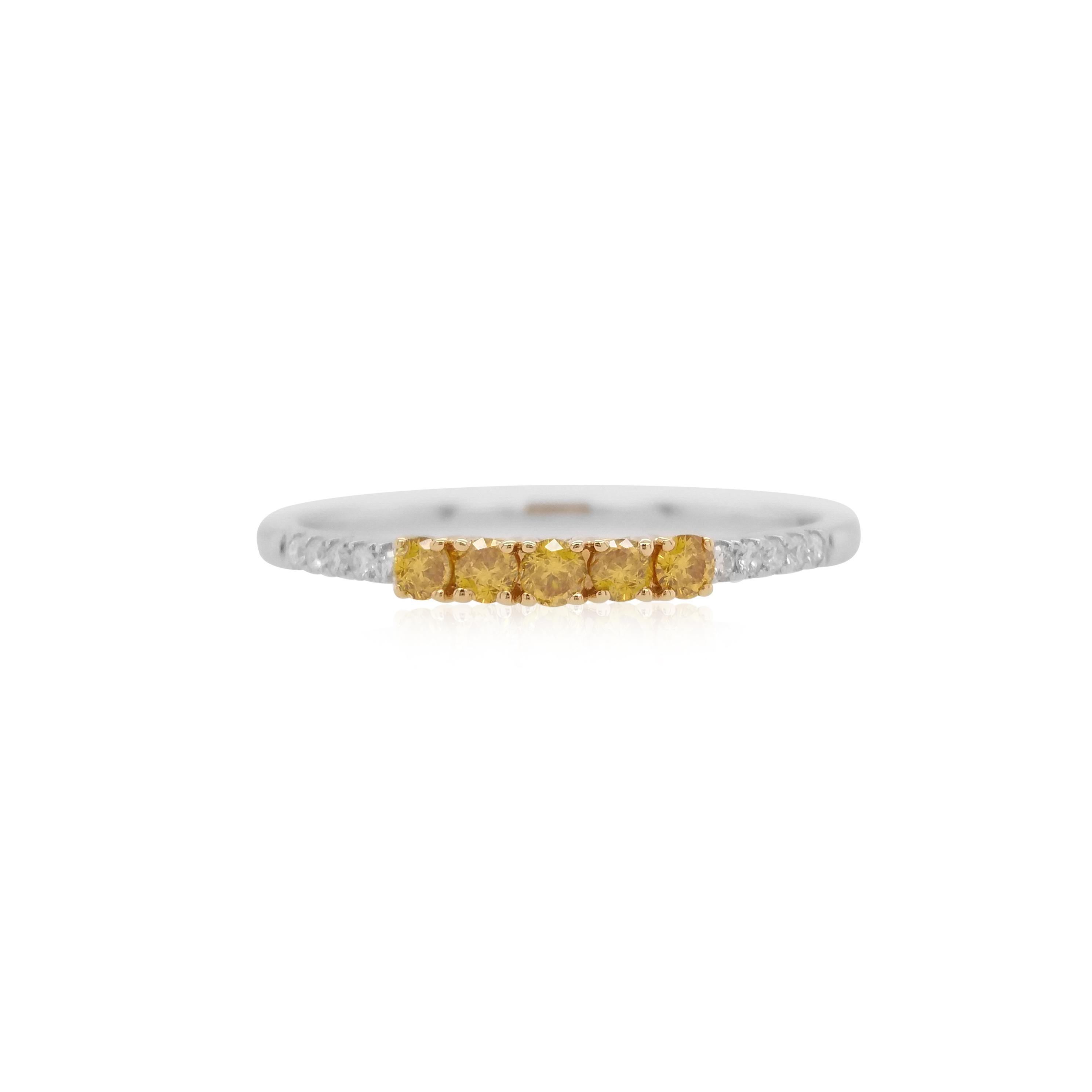 An elegant ring with brilliant cut Yellow diamonds styles with White diamonds set in an 18K gold band.

Yellow Diamonds- 0.160 cts
White Diamonds - 0.05 cts

HYT Jewelry is a privately owned company headquartered in Hong Kong, with branches in