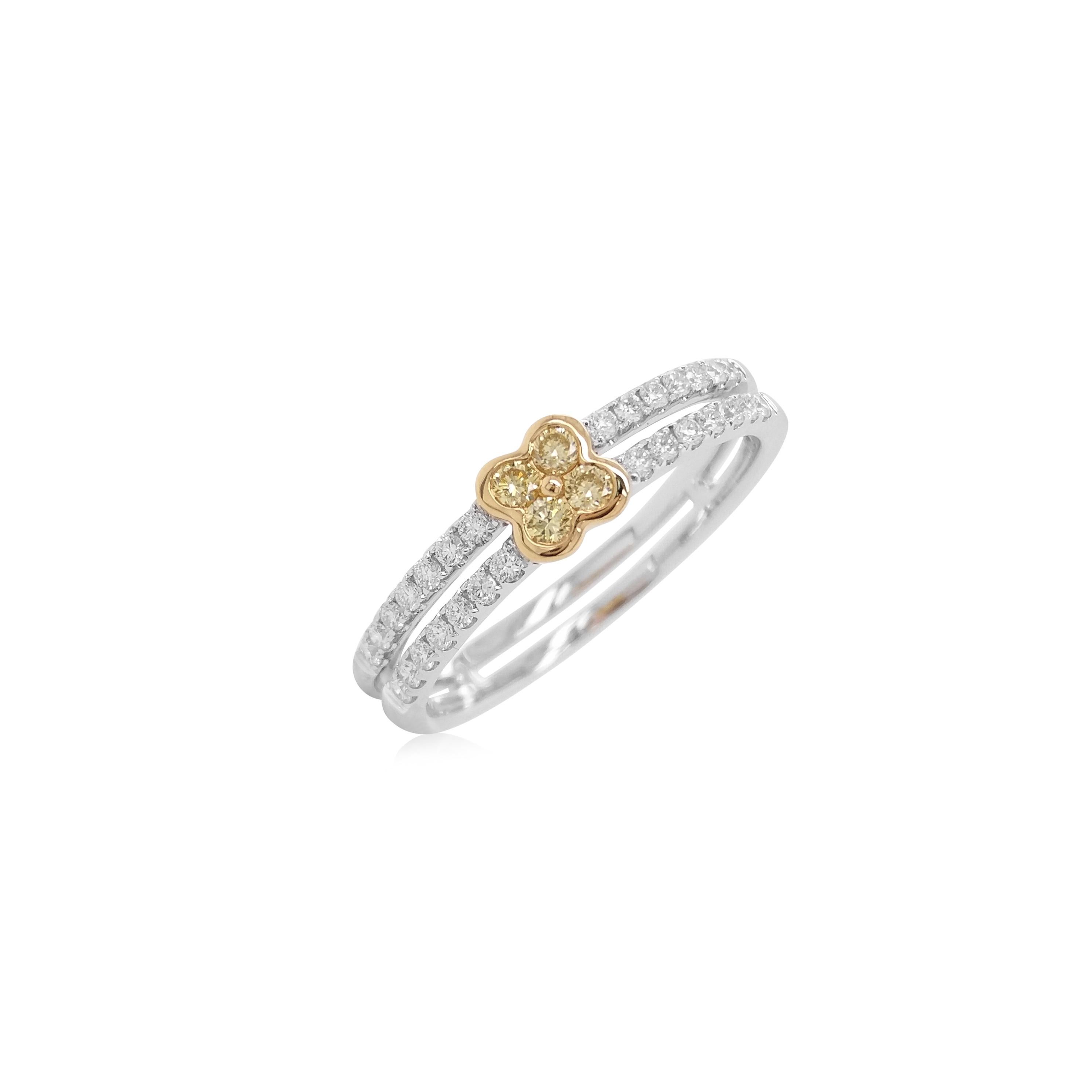 Ring aus 18 Karat Gold mit rundem gelbem Diamanten im Brillantschliff und weißem Diamanten (Rundschliff) im Angebot