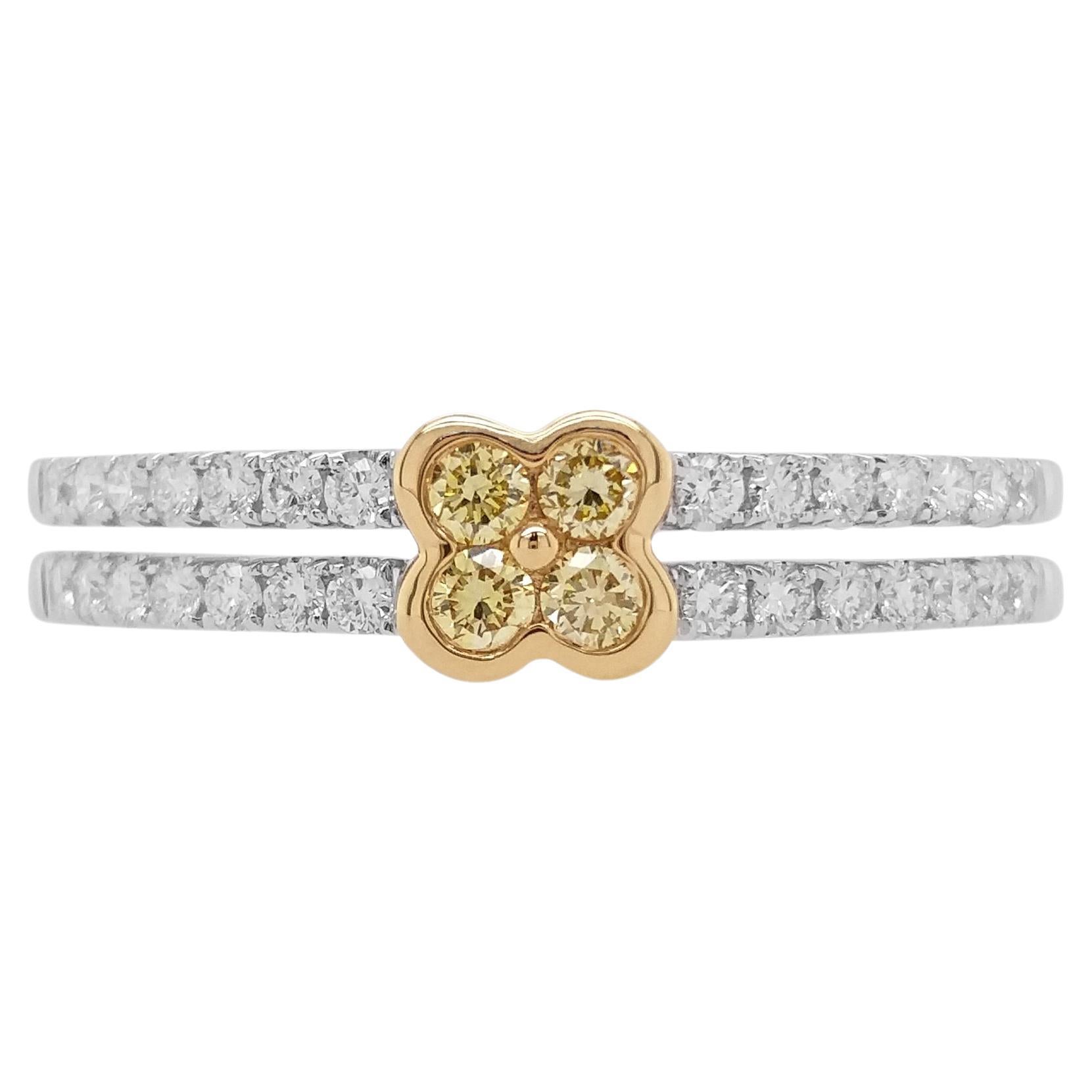 Ring aus 18 Karat Gold mit rundem gelbem Diamanten im Brillantschliff und weißem Diamanten im Angebot