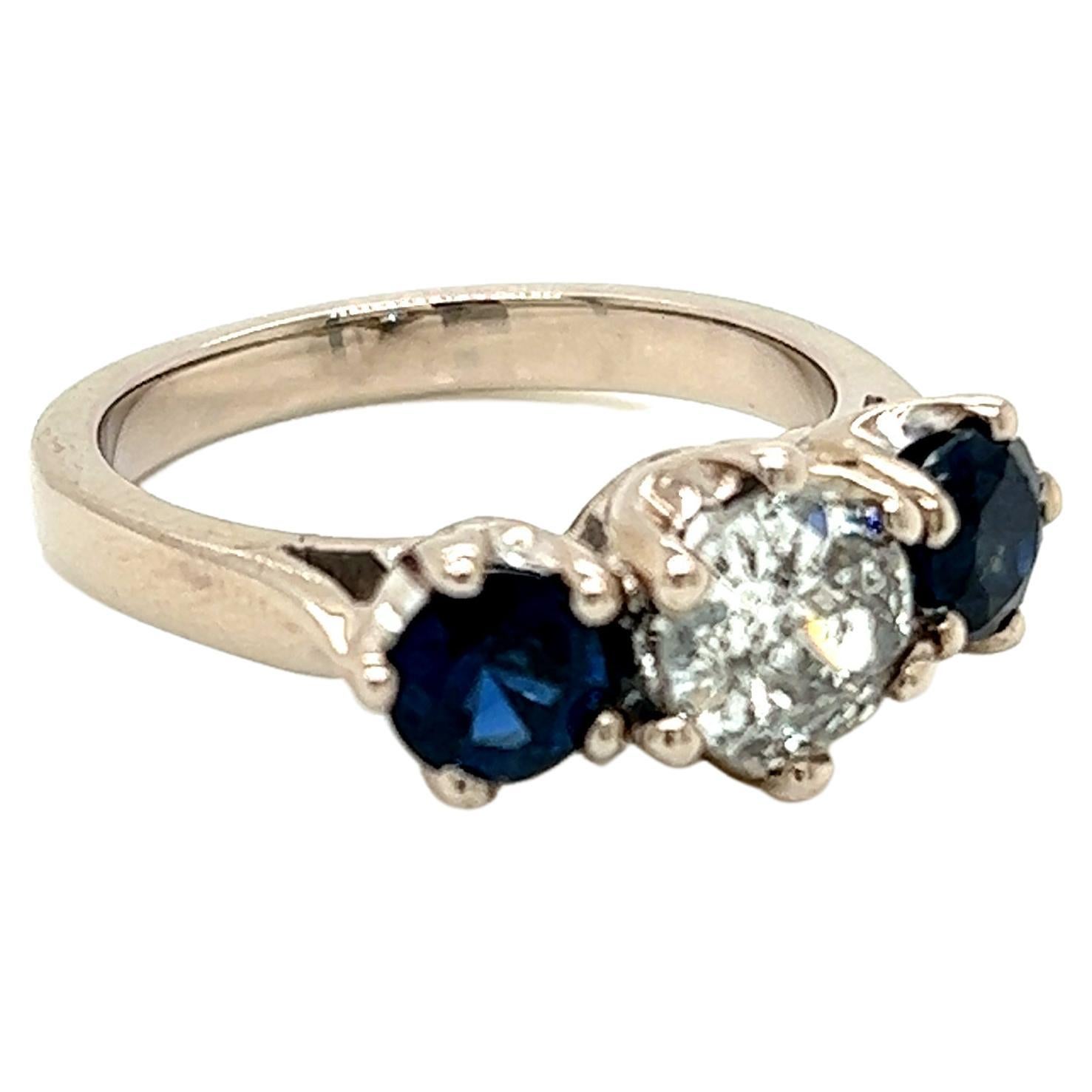 Round Brilliant Diamond and Blue Sapphire 3 Stone Ring in 18K White Gold For Sale