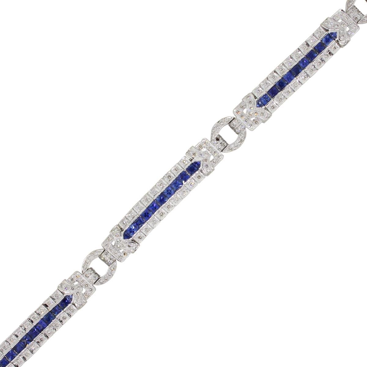 Material: 18k white gold
Diamond Details: Approximately 3.60ctw of round brilliant diamonds. Diamonds are I/J in color, SI in clarity
Gemstone Details: Princess cut blue sapphires measuring approximately 4mm x 4mm and trillion shape sapphires