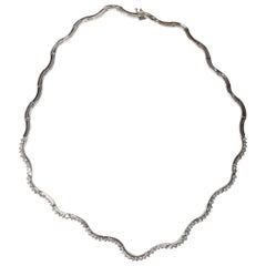 Round Brilliant Diamond Articulated Wavy Tennis Necklace in 14k White Gold