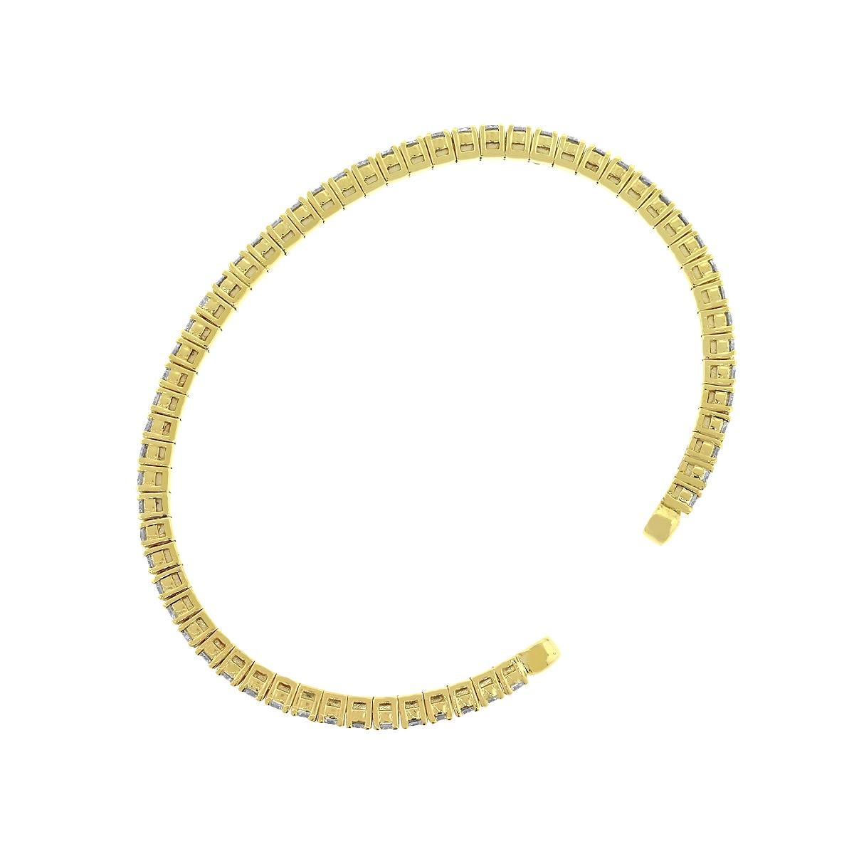 Style: Diamond Bangle
Material: 14k Yellow Gold
Diamond Details: Approximately 2.60ctw of round brilliant diamonds. Diamonds are G/H in color and VS in clarity.
Total Weight: 8.9g (5.7dwt)
Bracelet Measurements: Will fit a 6″ Wrist
SKU: A30311894