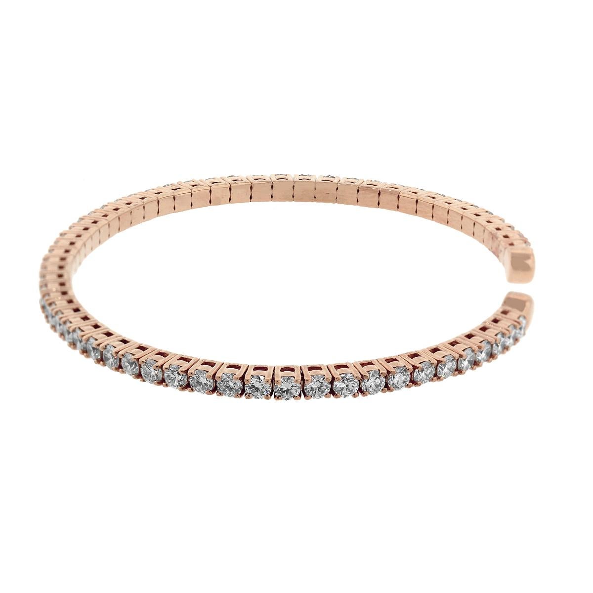Style: Diamond Bangle
Material: 14k rose Gold
Diamond Details: Approximately 2.60ctw of round brilliant diamonds. Diamonds are G/H in color and VS in clarity.
Total Weight: 8.9g (5.7dwt)
Bracelet Measurements: Will fit a 6″ Wrist
SKU: A30311893