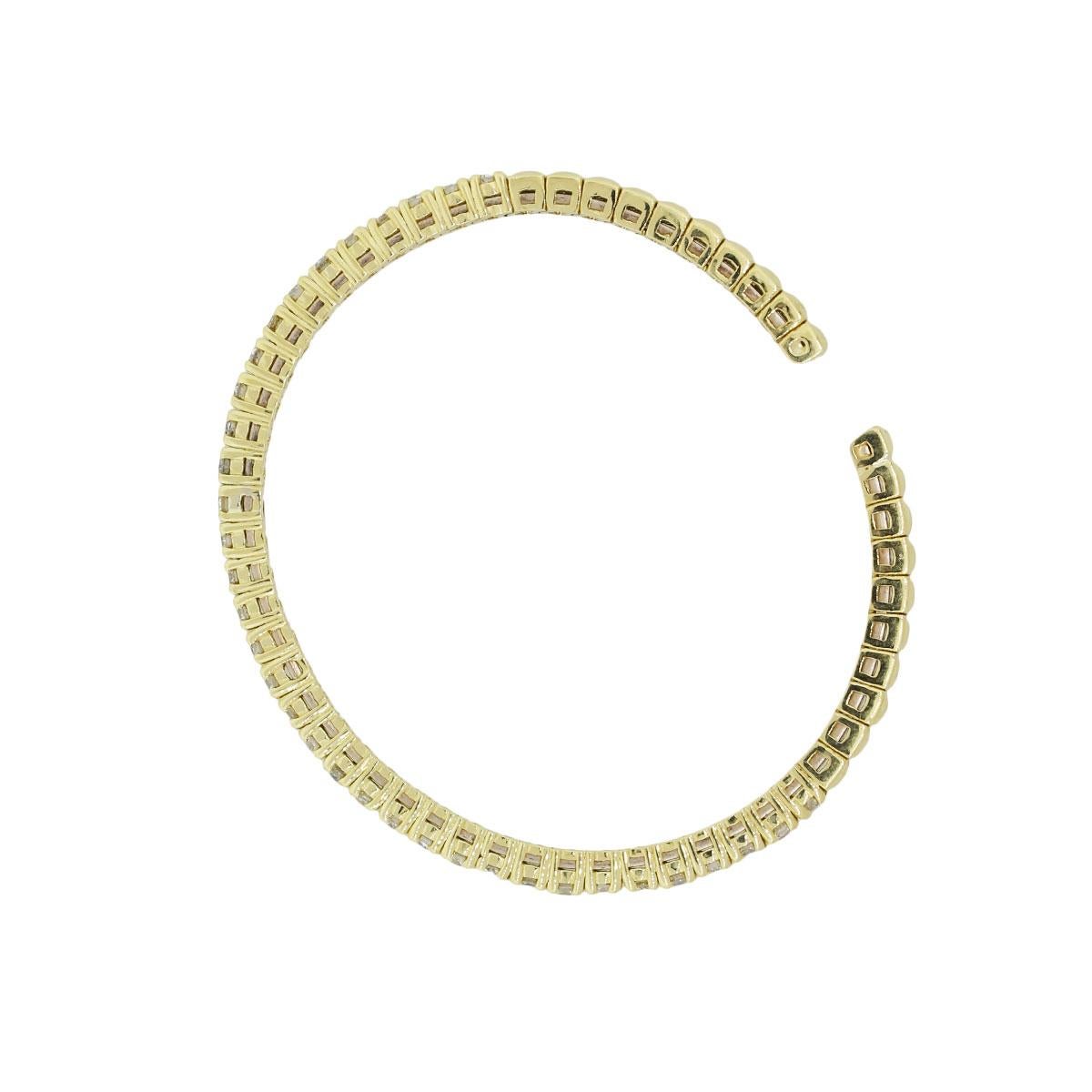 Material: 18k yellow, white and rose gold
Diamond Details: Approximately 7ctw of round brilliant diamonds. Diamonds are G/H in color and VS in clarity
Clasp: Flexible (Wrap Around)
Measurement: Each bangle cuff will fit a 5.50″ wrist
Total Weight: