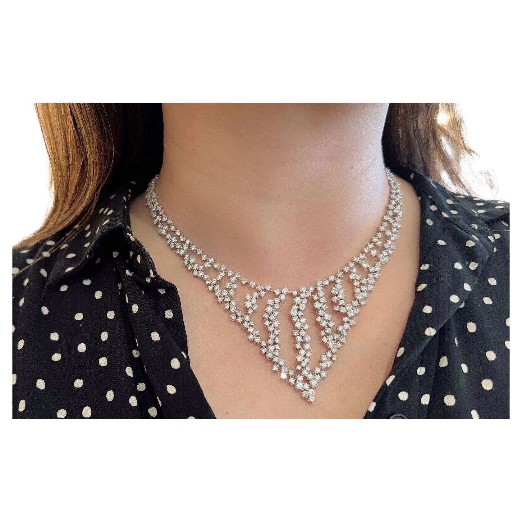 Round Brilliant Diamond Bib Necklace 25.00 cttw in 18k White Gold 

This is a spectacular statement necklace in 18k white gold featuring a total of 25.00 carats of lively, white brilliant cut diamonds set in an open cascading design that elegantly