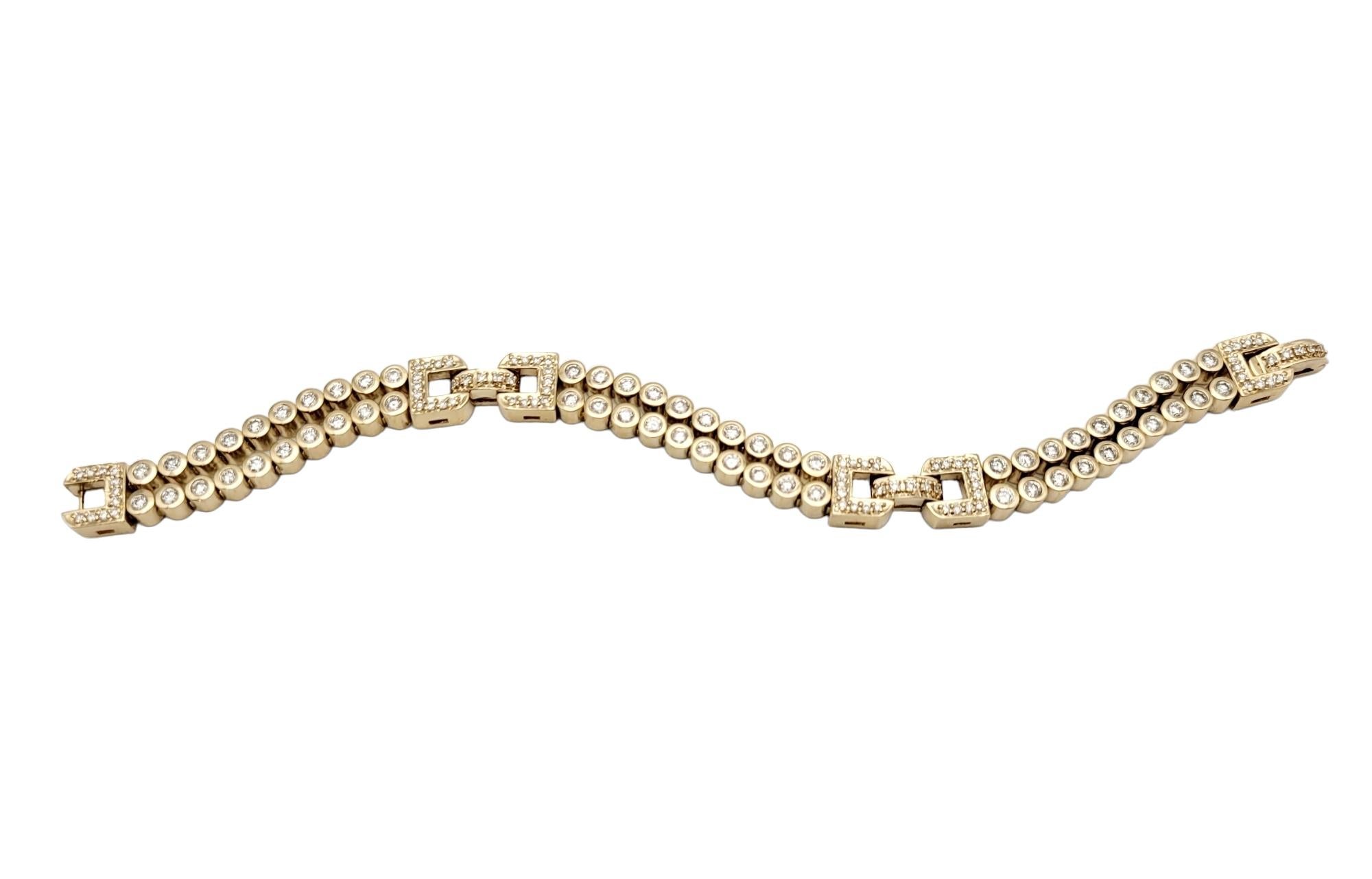 This exquisite gold bracelet is a stunning piece of elegance. Crafted from 14 karat yellow gold, the bracelet features a unique design with bubble link chains that add a touch of playfulness to its sophistication. Each bubble link is adorned with a