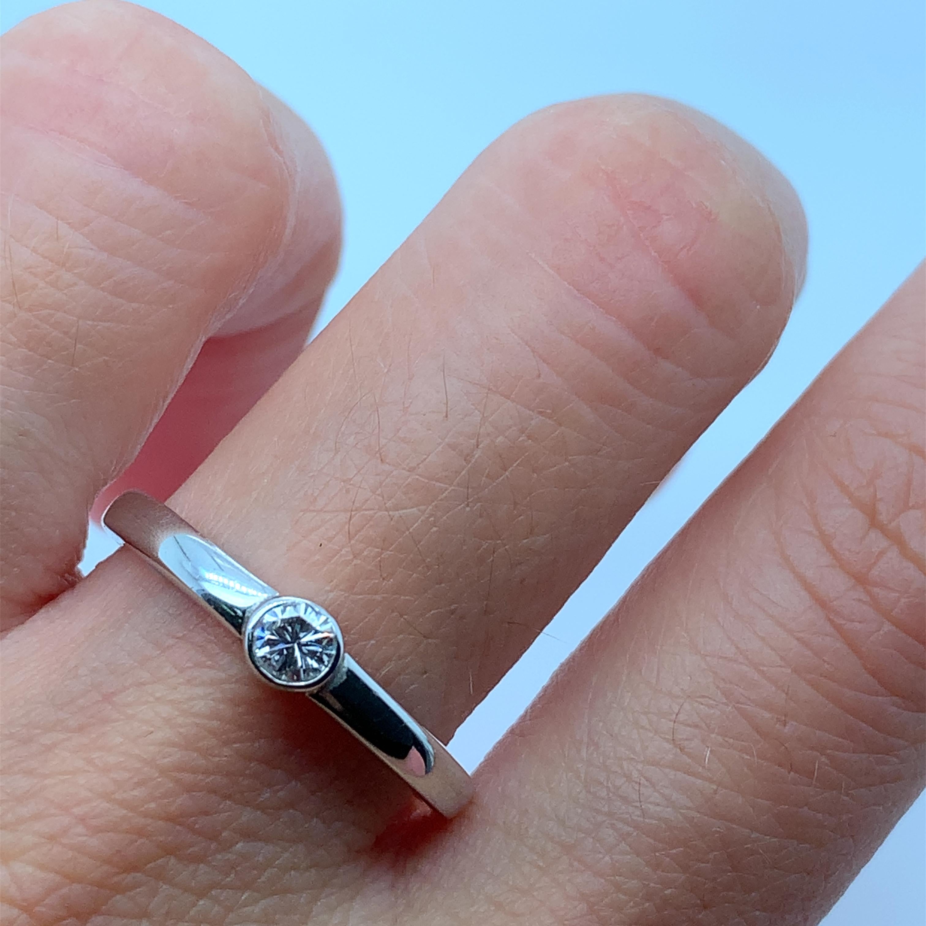 This beautiful ring features a stunning 0.15ct diamond set in a classic solitaire style on a chunky 18ct white gold band. The diamond is a natural round shape with a G colour grade and a very slightly included (VS1) clarity grade. The ring also