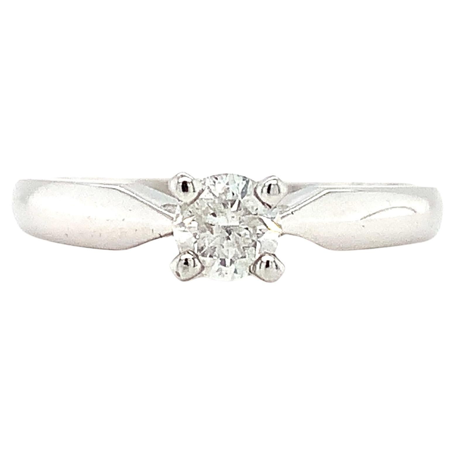 Anillo de compromiso solitario clásico diamante brillante redondo oro blanco 18k