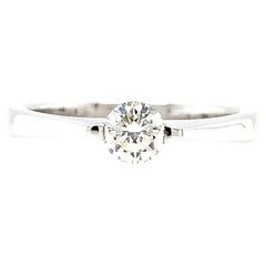 Round brilliant diamond classic solitaire floating engagement ring 18k gold