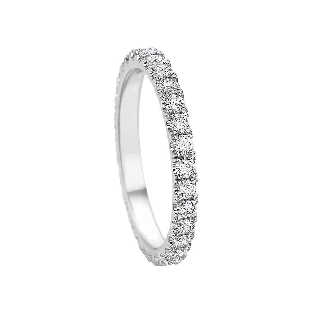Comfort fit eternity band ring, featuring near-colorless round brilliant-cut diamonds bead-set in polished platinum.

Thirty diamonds weighing 0.70 total carats
1.9mm wide
Size 6