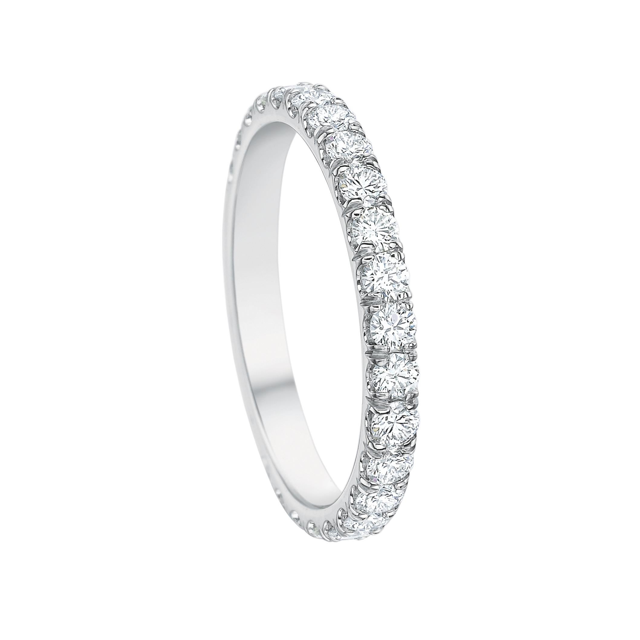 Diamond eternity band ring, showcasing round brilliant-cut diamonds set in a 'comfort fit' platinum mounting.

Twenty-eight diamonds weighing 1.00 total carats
2.1mm wide
Size 6