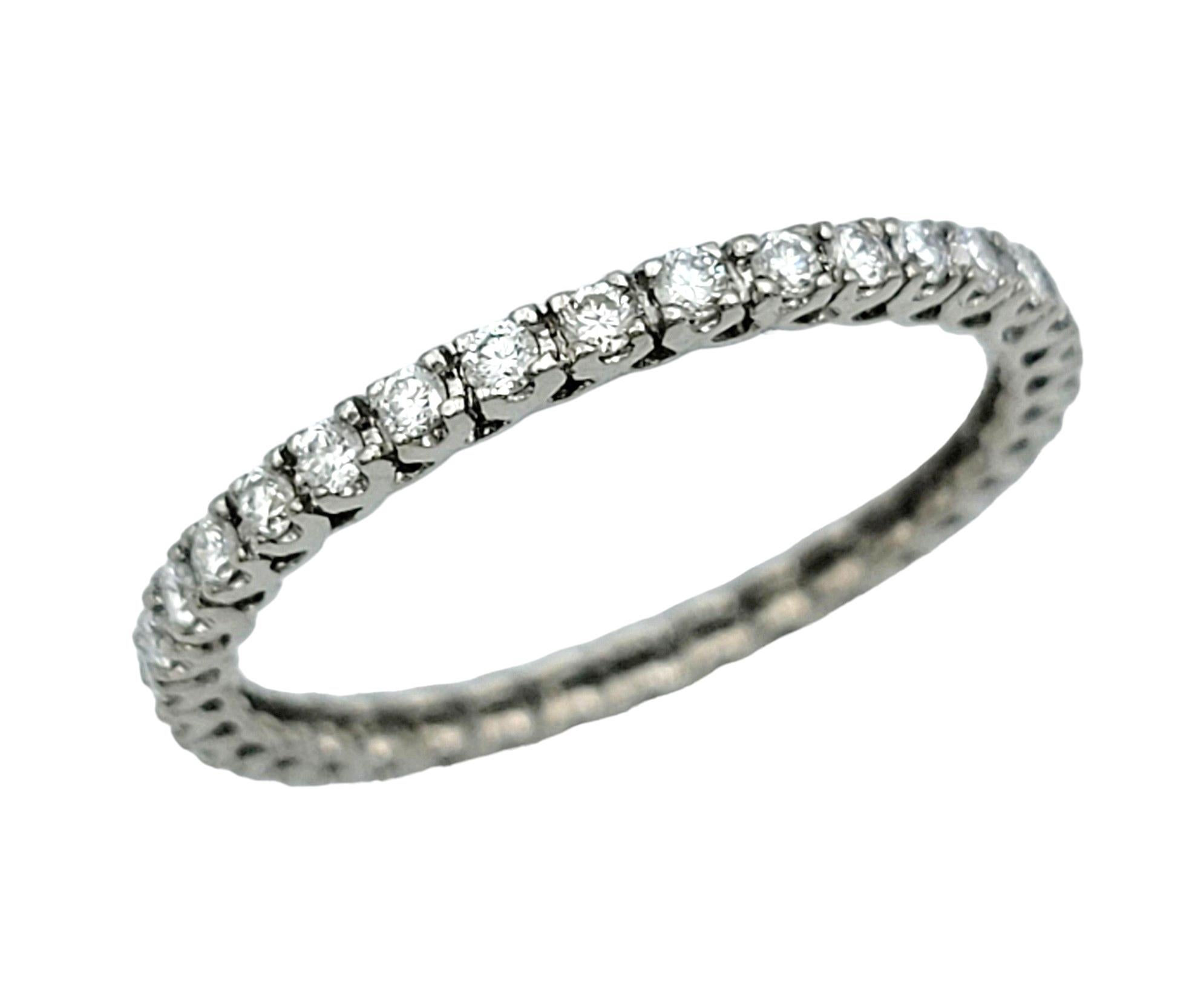 Ring Size: 6.25

This stunning eternity band ring features a single row of round diamonds set in delicate 18 karat white gold. The diamonds are meticulously arranged in a continuous circle, symbolizing eternal love and commitment.

With its sleek