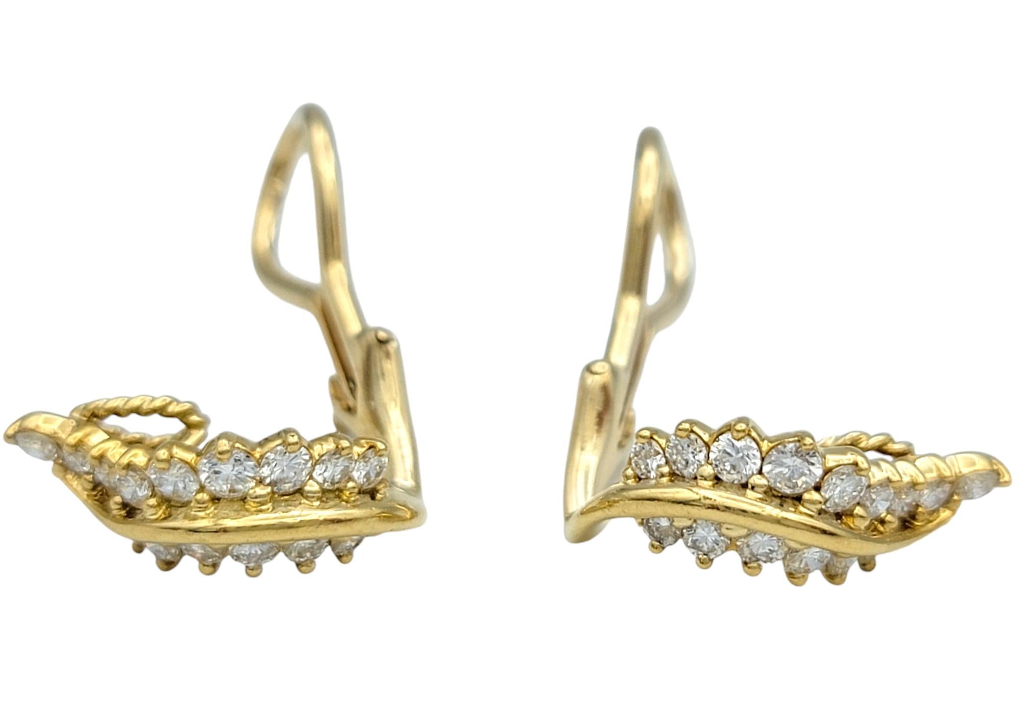 Embrace the beauty of nature with these stunning clip-on earrings, elegantly crafted in 18 karat yellow gold with a captivating fern leaf design. Each earring showcases the delicate, flowing lines of fern leaves, brought to life with intricate