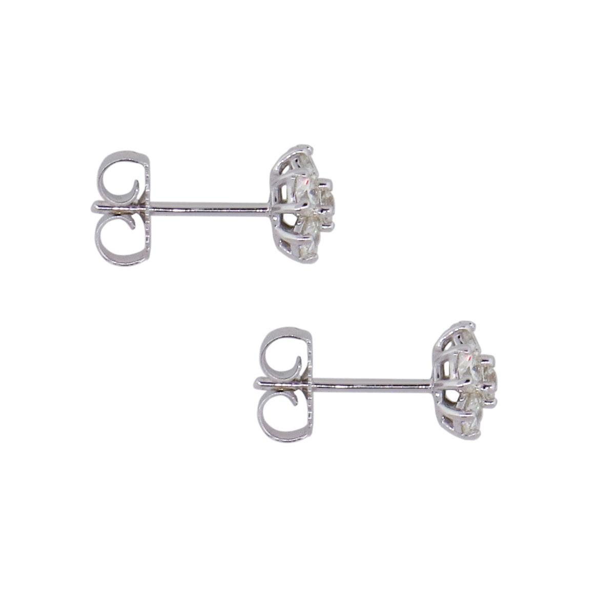 Material: 14k white gold
Diamond Details: Approximately 1.22ctw of round brilliant diamonds. Diamonds are G/H in color and VS in clarity
Earring Measurements: 0.63″ x 0.30″ x 0.30″
Total Weight: 1.7g (1.1dwt)
Earring backs: Post friction
Additional
