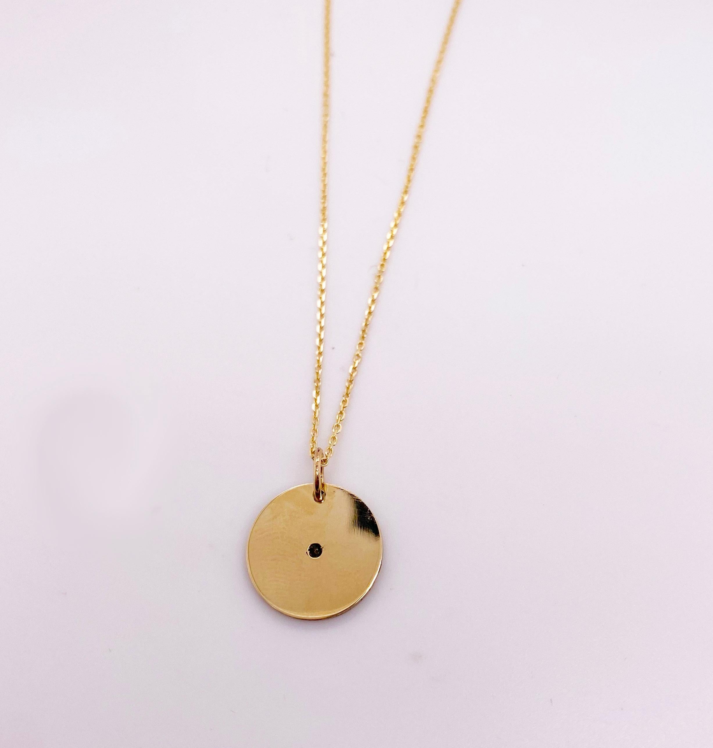 Gorgeous Diamond Disk Necklace! 14 Karat Yellow Gold disk necklaces are huge in fine jewelry fashion! You can find them in every magazine. This diamond necklace is the perfect gift for any occasion and has a beautiful satin finish! With an