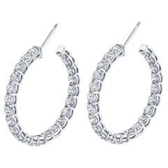 Boucles d
oreilles en diamants brilliants ronds