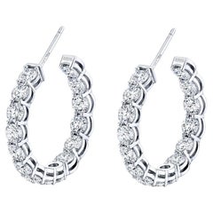 Boucles d
oreilles en diamants brilliants ronds