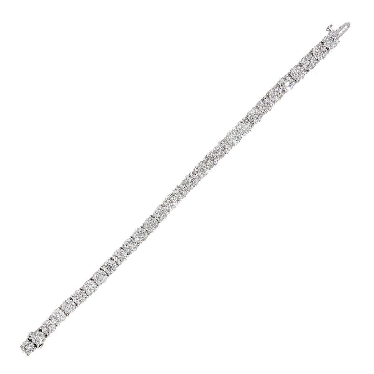 Material: 14k white gold
Diamond Details: Approximately 6ctw of round brilliant diamonds. Diamonds are G/S in color and I1 in clarity.
Measurements: 7″ in length
Clasp: Tongue in box clasp
Total Weight: 15.2g (9.8dwt)
Additional Details: This item