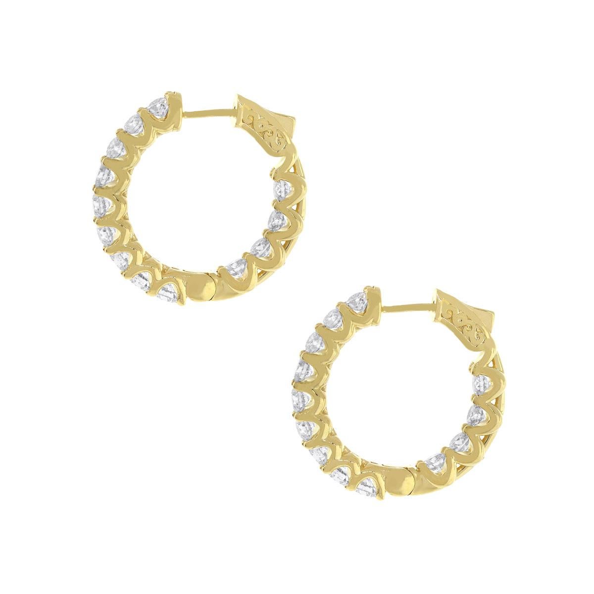 Material: 14k Yellow gold
Style: Diamond inside out hoop earrings
Diamond Details: 26 Stones, approximately 4.26ctw of round brilliant diamonds. Diamonds are G/H in color and VS in clarity.
Earring Measurements: 1″ x 0.20″ x 1″
Total Weight: 12.4g