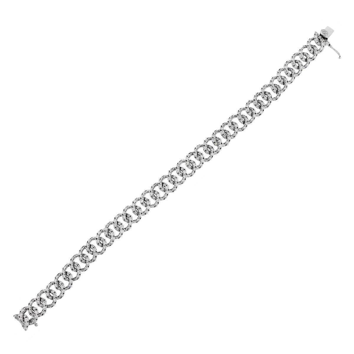 Material: 18k white gold
Diamond Details: Approximately 6.59ctw of round brilliant diamonds. Diamonds are G/H in color and VS in clarity
Fastening: Tongue in box clasp with safety latch
Length: Will fit a 7.5″ wrist
Item Weight: 26.3g (16.9dwt)
SKU: