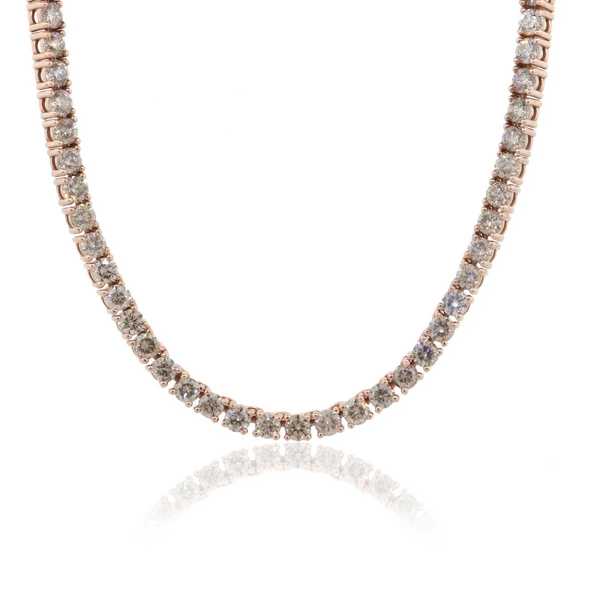 Material: 14k Rose Gold
Diamond Details: Approx. 54.15ctw of round cut diamonds. Diamonds are L/M in color and SI in clarity
Measurements: Necklace measures 27″ in length.
Fastening: Tongue in box clasp with safety latch
Item Weight: 46.4g